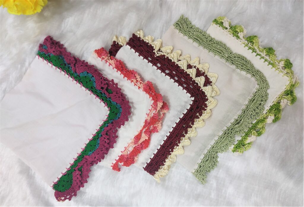 Plain white handkerchief with lacey crochet borders